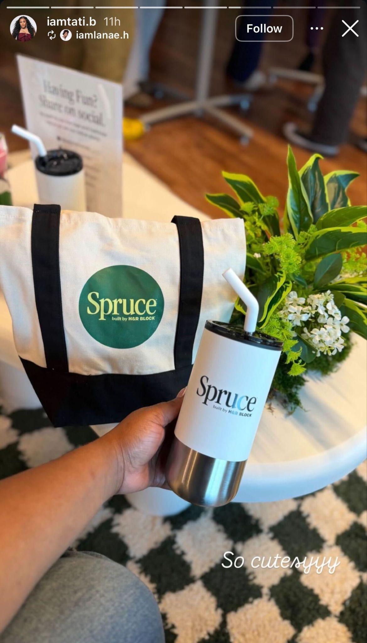 Influencer holding H&R Block branded tote and tumbler